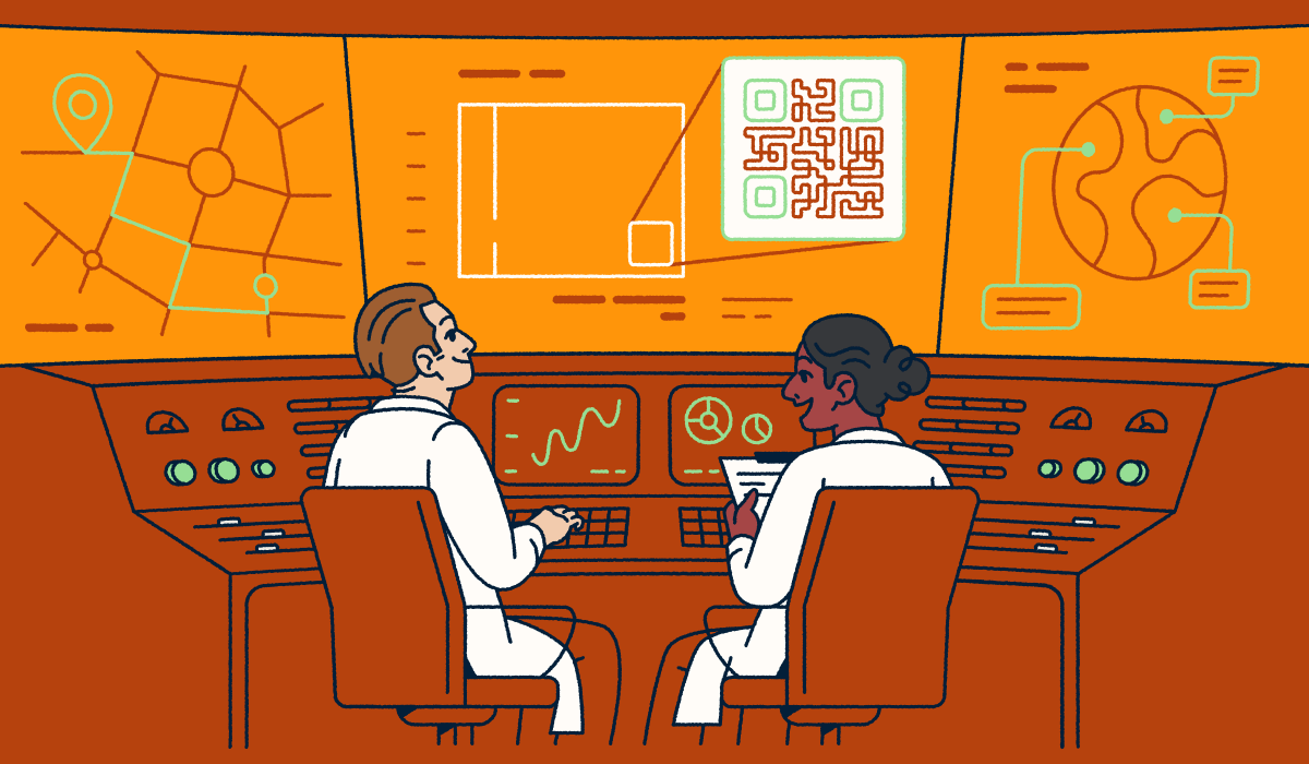 Two scientists sitting at a console looking at screens with QR Codes and graphs.