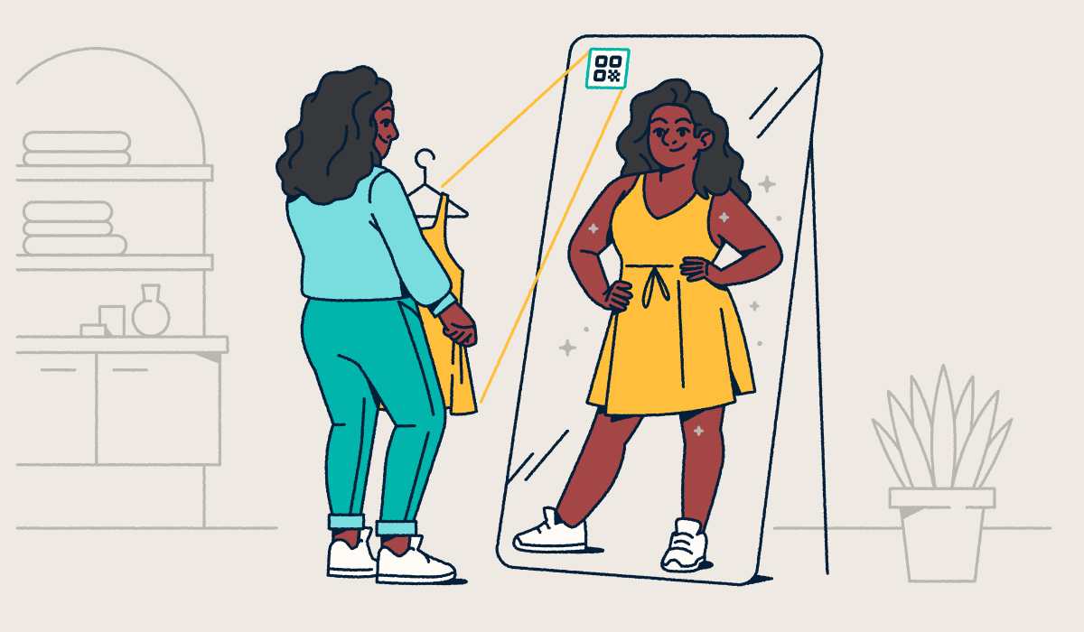 A woman in a green outfit standing in front of a floor-length mirror with an AR QR Code on it. She's holding a yellow dress that's from the QR Code, and her reflection shows her in the dress.