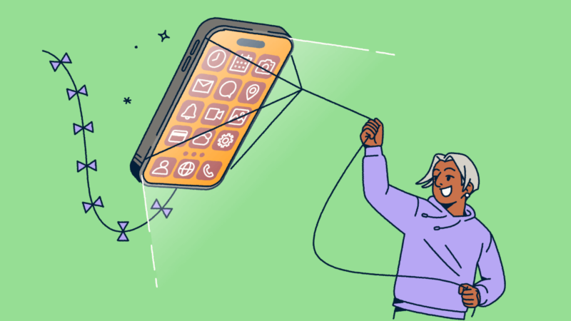 A person flying a mobile phone like a kite.