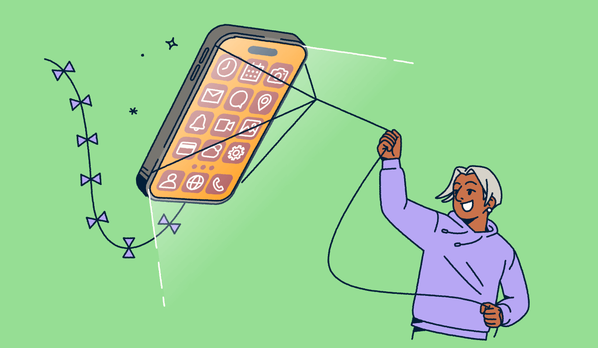 A person flying a mobile phone like a kite.