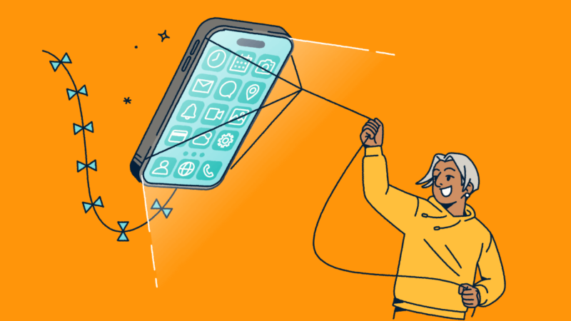 A person flying a mobile phone like a kite.