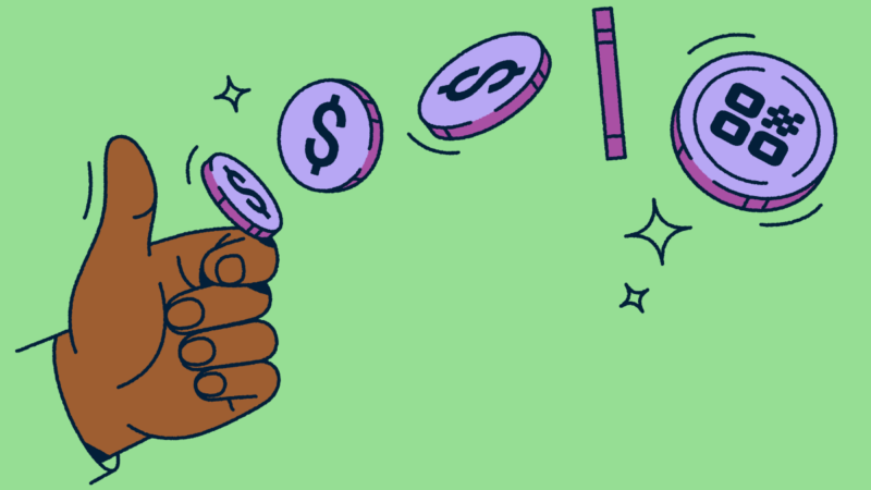 A hand flipping a coin with a QR Code on it.