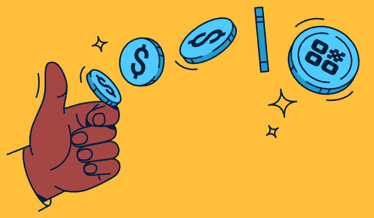 A hand flipping a coin with a QR Code on it.