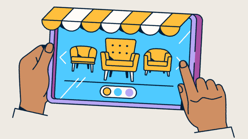 Hands holding a tablet that looks like a retail front with an awning. Furniture is displayed on the screen.