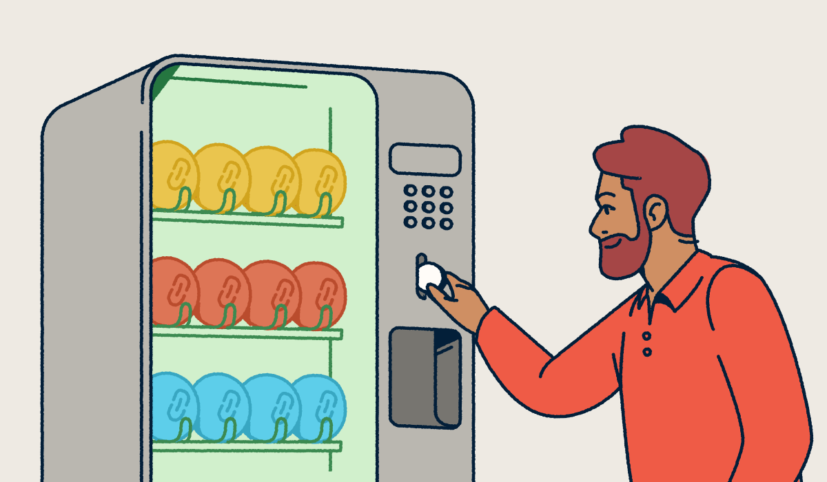 A man putting a coin into a vending machine full of various link shorteners.