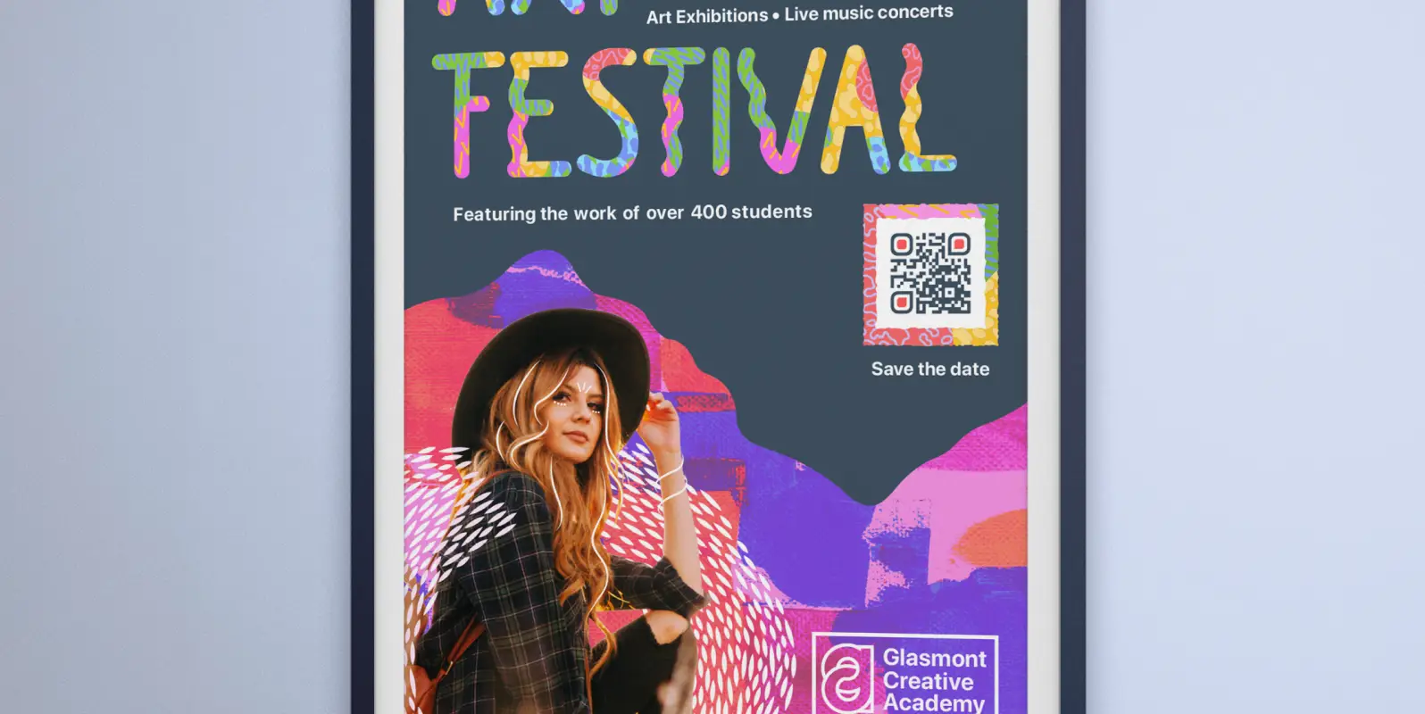 An academy's Art Festival save-the-date poster advertisement on a wall.