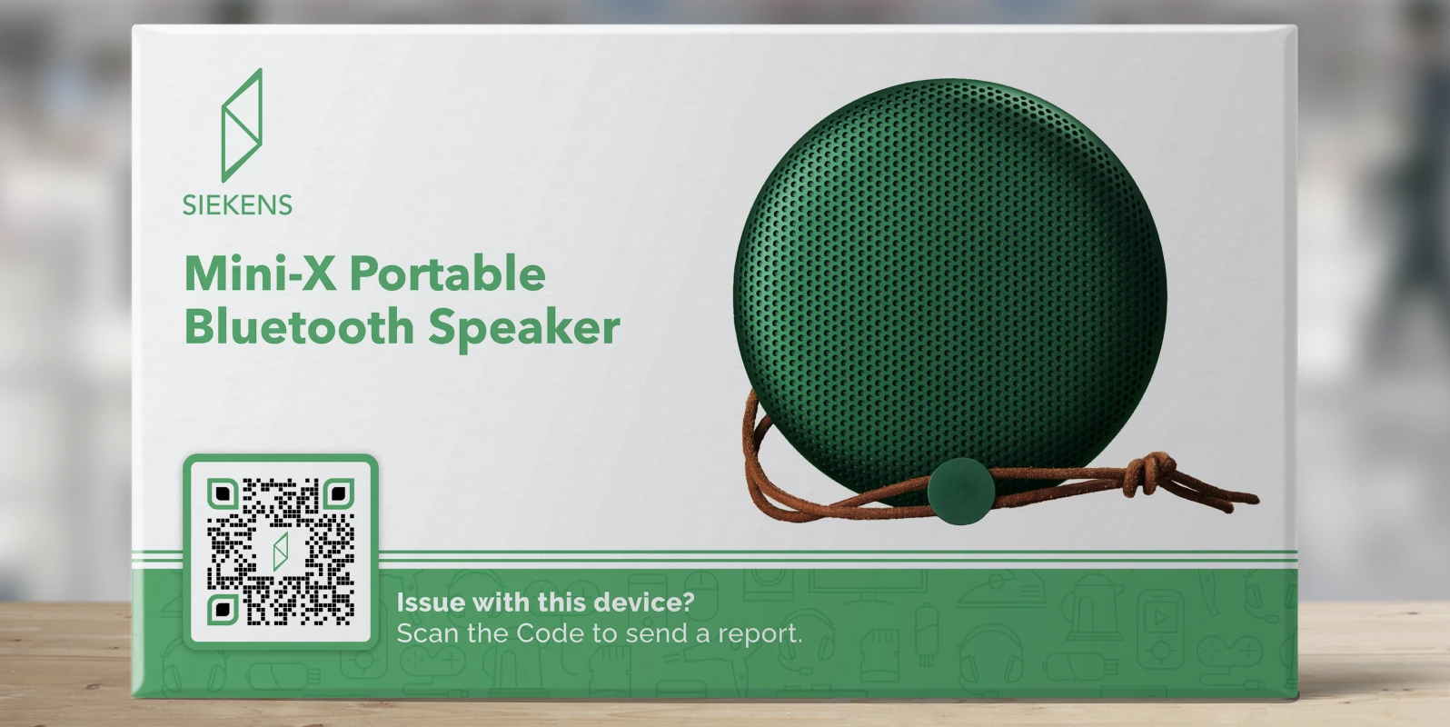 White and green bluetooth speaker packaging featuring the speaker and a QR Code.